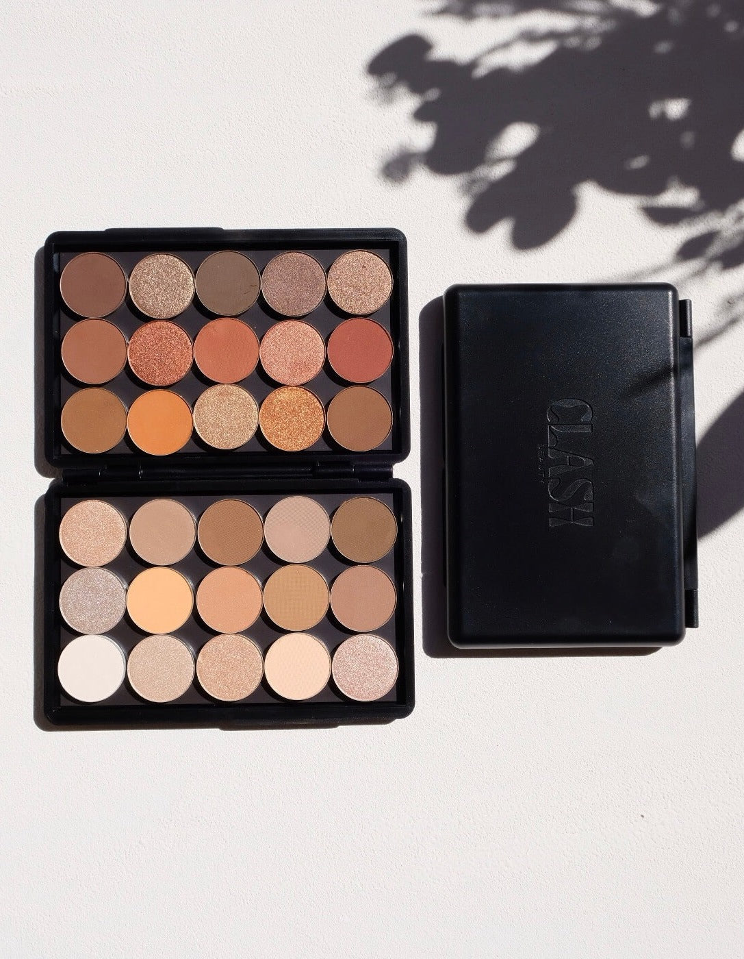 Clash Beauty Matte Black Double Sided Empty Eyeshadow Magnetic Makeup Palette for Makeup Artists. Image shows 30 round eyeshadows. 